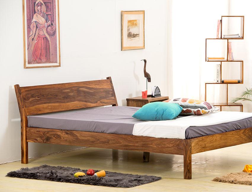 Buy solid sheesham wood bed online with storage in platform design